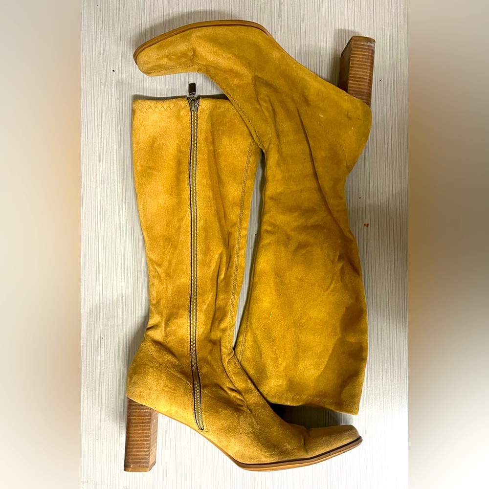 Knee high heeled boots